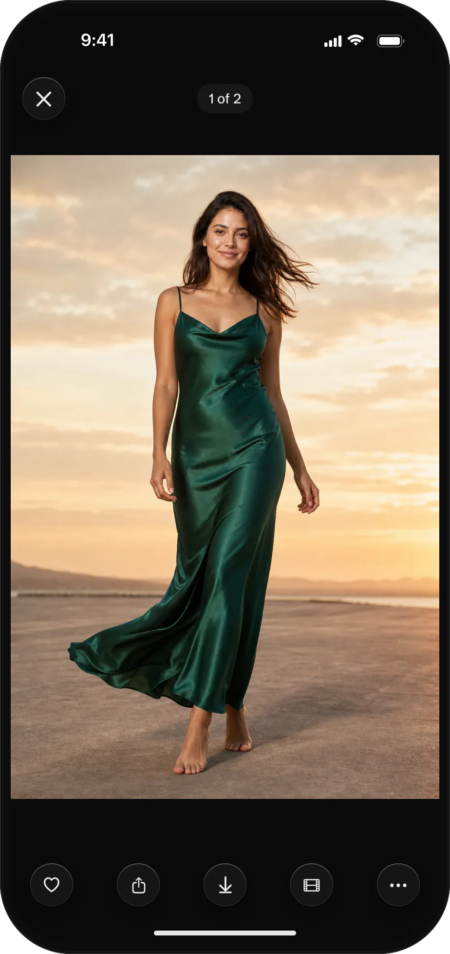 The AURA app’s photo viewer: a finished photo of a woman in an emerald slip dress on a beach at sunset